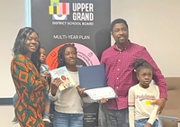 Fergus student Charis Alabi receives Ovation Award from school board post image