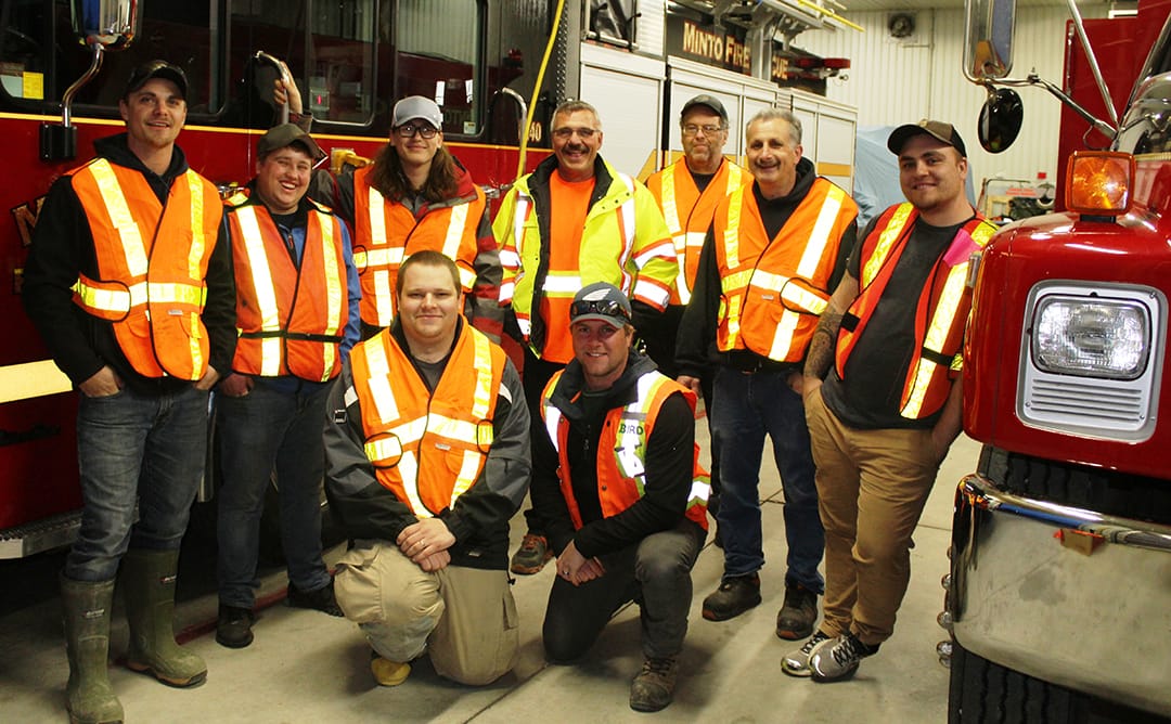 Firefighters clean up adopted  roadway
