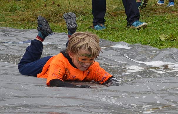Mud, sweat and cheers at 'mini mudster' course for Mudmoiselle fundraiser