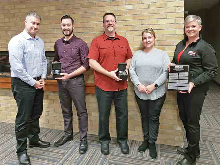 Police officers honoured by Crime Stoppers for educational efforts
