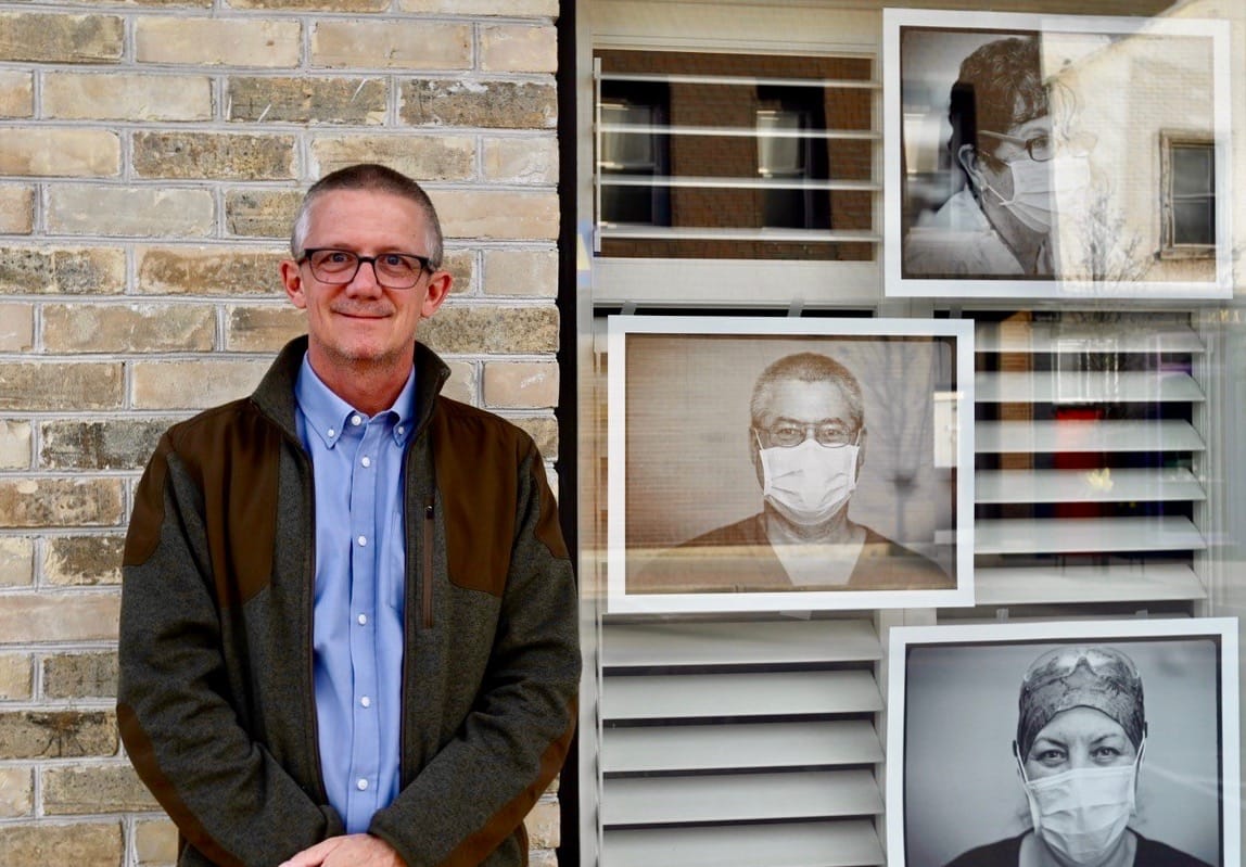 Doctor uses photography to put face on struggles of frontline workers