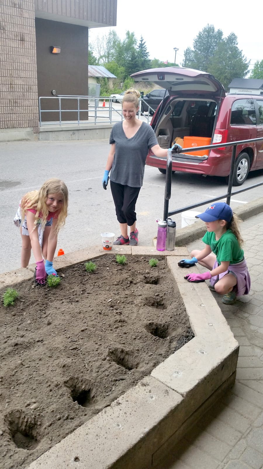 Arthur Junior Horticultural  Society help plant a garden at local post office