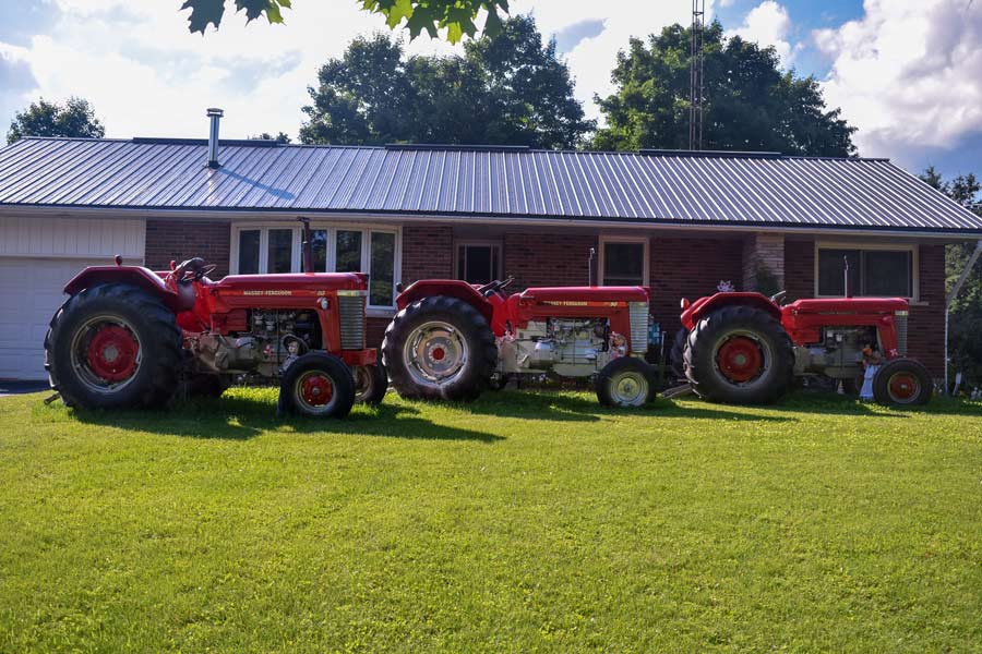 Belwood homeowner proudly displays antique tractors