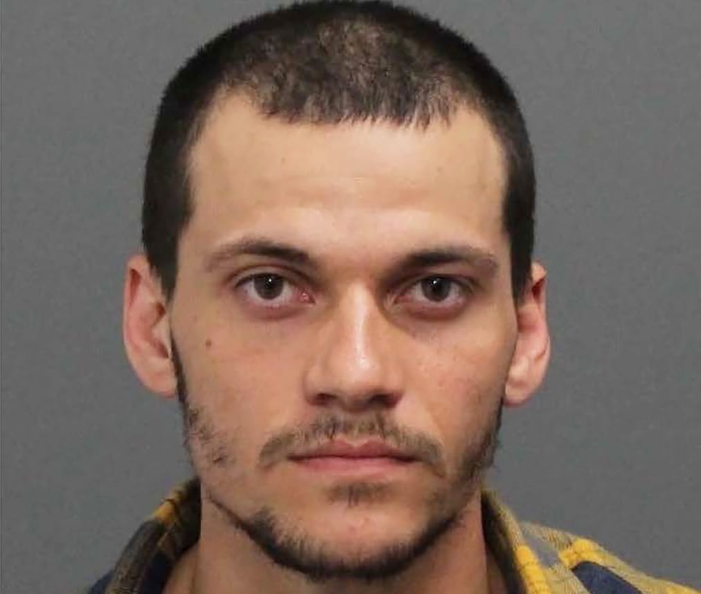 Police issue arrest warrant for suspect in 2015 murder of Frederick 'John' Hatch