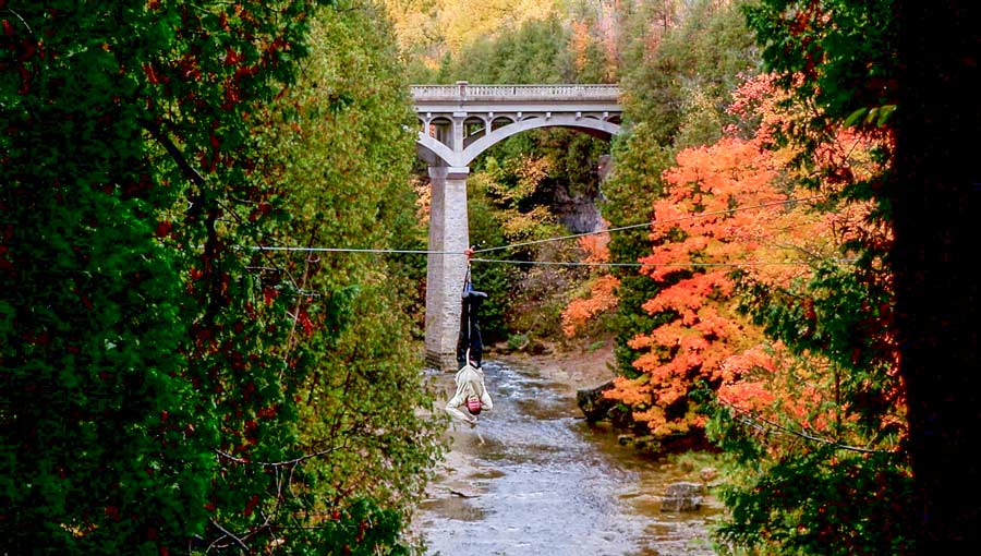Magician escapes from straightjacket while suspended over Elora Gorge