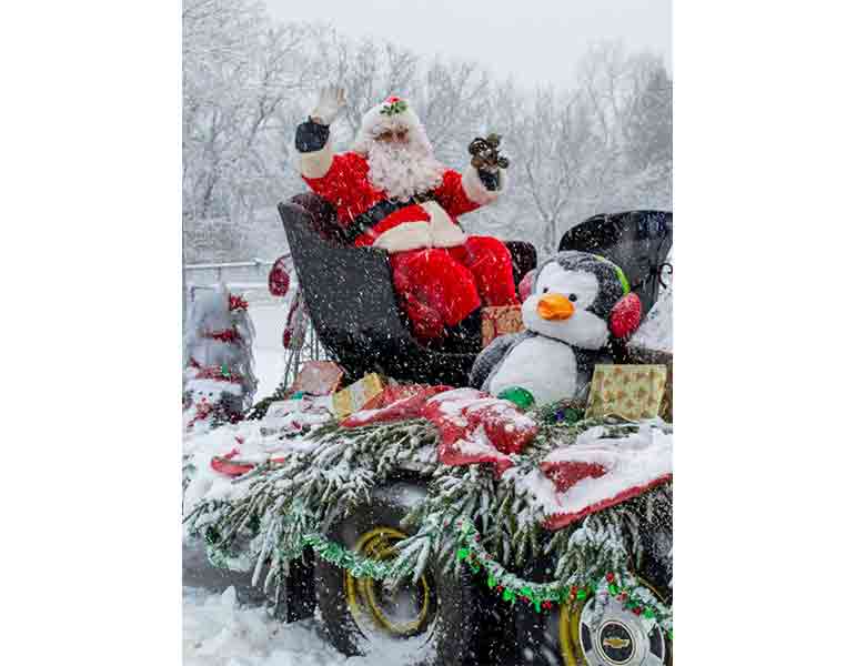 Snow made for a festive experience at Santa's Drive-Thru Parade in Puslinch