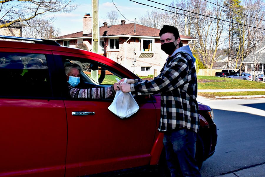 Church youth group hosts 'Drive Up & Drive On Dinners'