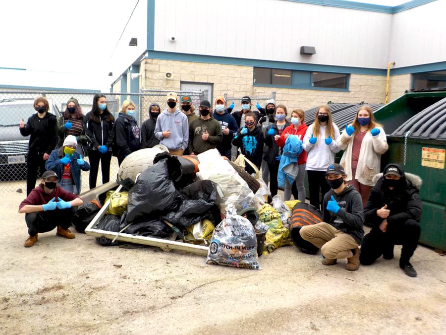 Wellington Heights Secondary School CELP students clean up around Mount Forest