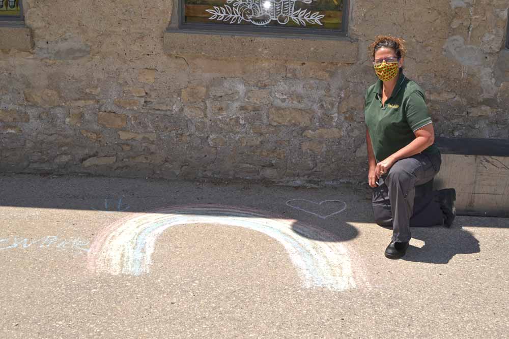 Chalk rainbows drawn for Renegade Rainbows Initiative