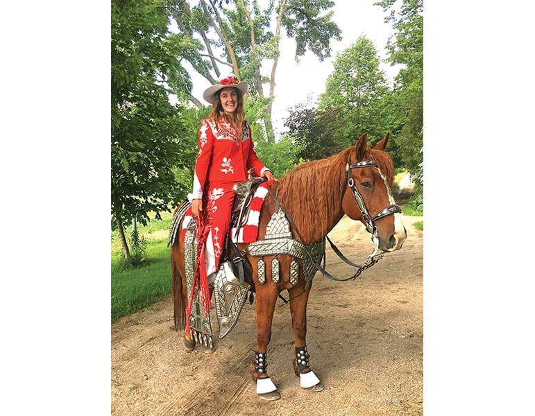 A one-horse parade in Canada Day colours