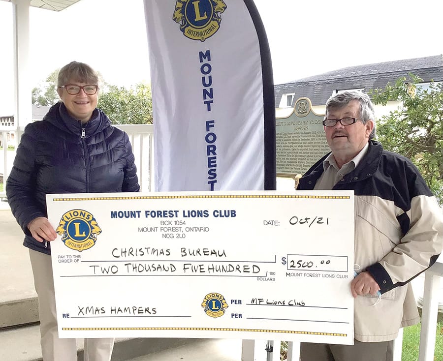 Lions donate $2,500 to Christmas Bureau program