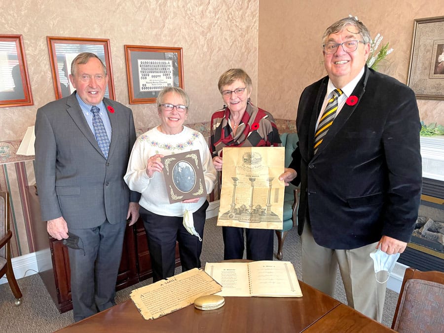 Century-old Mason certificate presented to local lodge officials