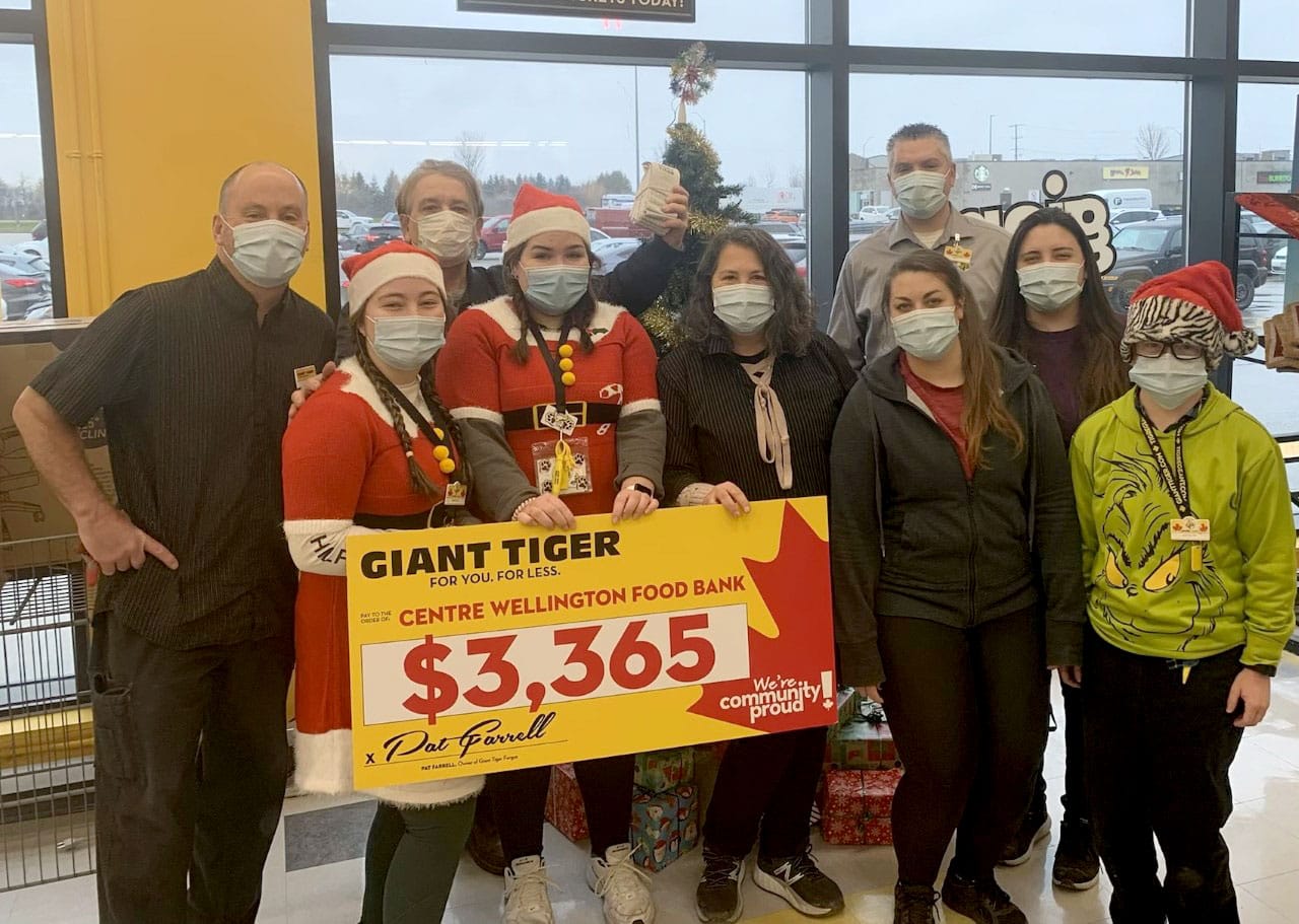 Giant Tiger staff make donation to Centre Wellington Food Bank