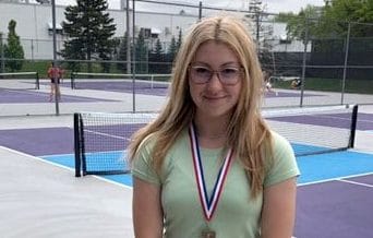 Wellington Heights student wins gold at CWOSSA tennis championships