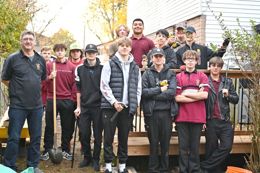 St. James Catholic High School bands together  to build accessibility ramp for community member
