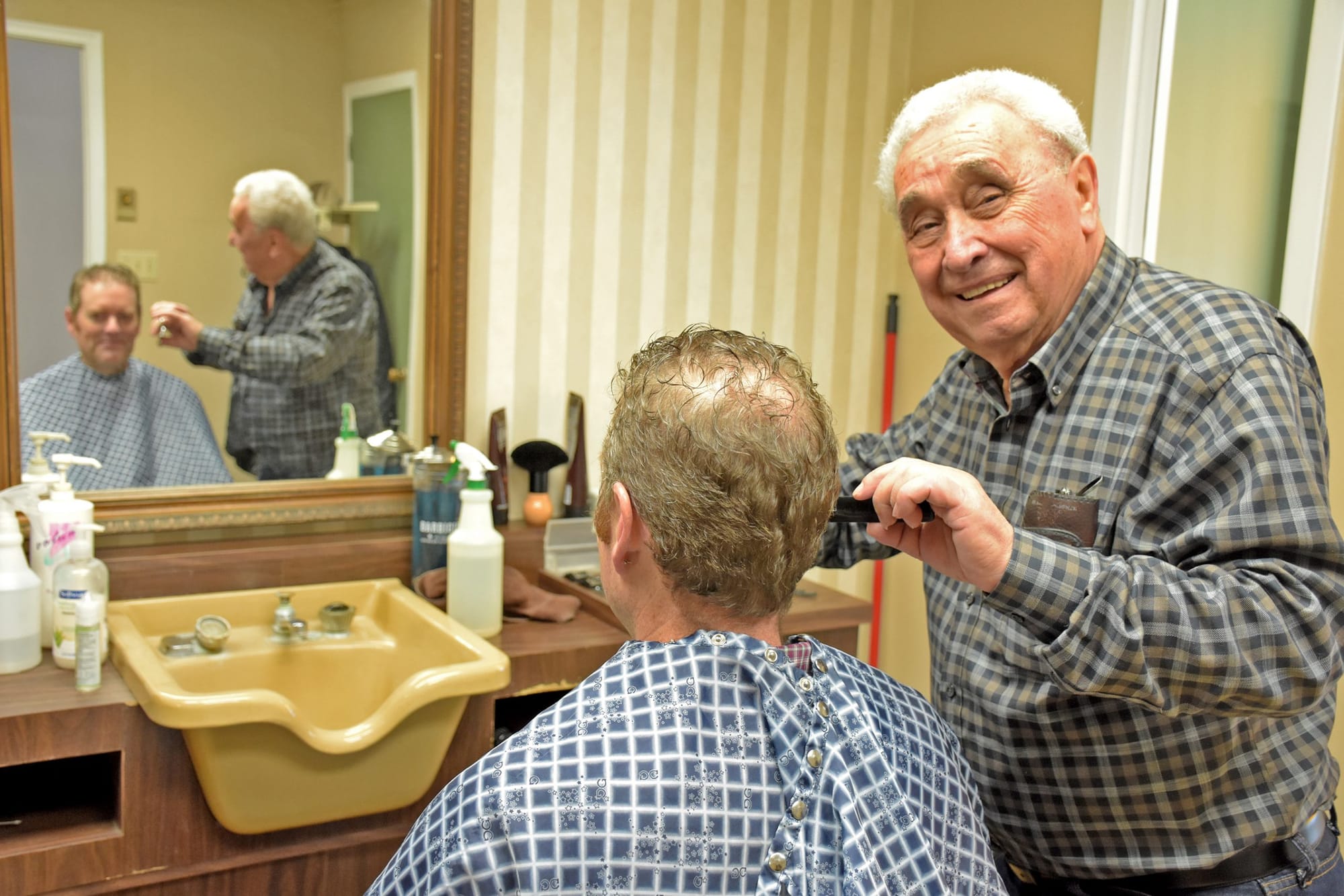 After cutting hair for 50 years, Frank Moretti is ready to retire
