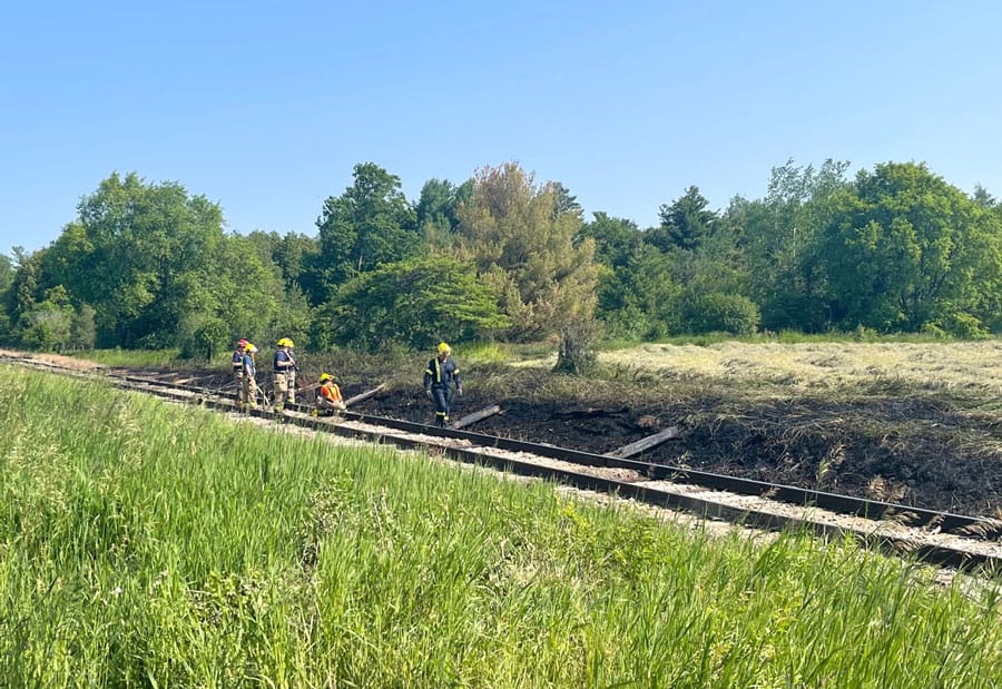 Grass fire along train tracks in Arkell sparks worry among residents