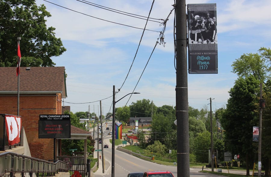 Arthur lamp posts sport banners for Pride, local history