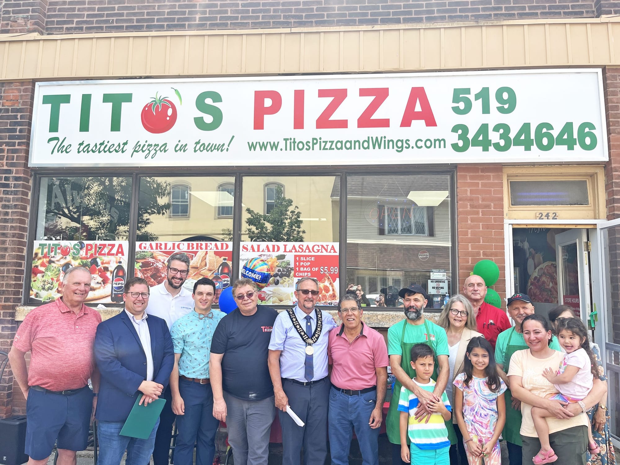 Celebrating the opening of Tito's Pizza