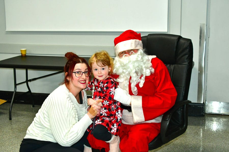 Santa meets with children in Kids Ability program