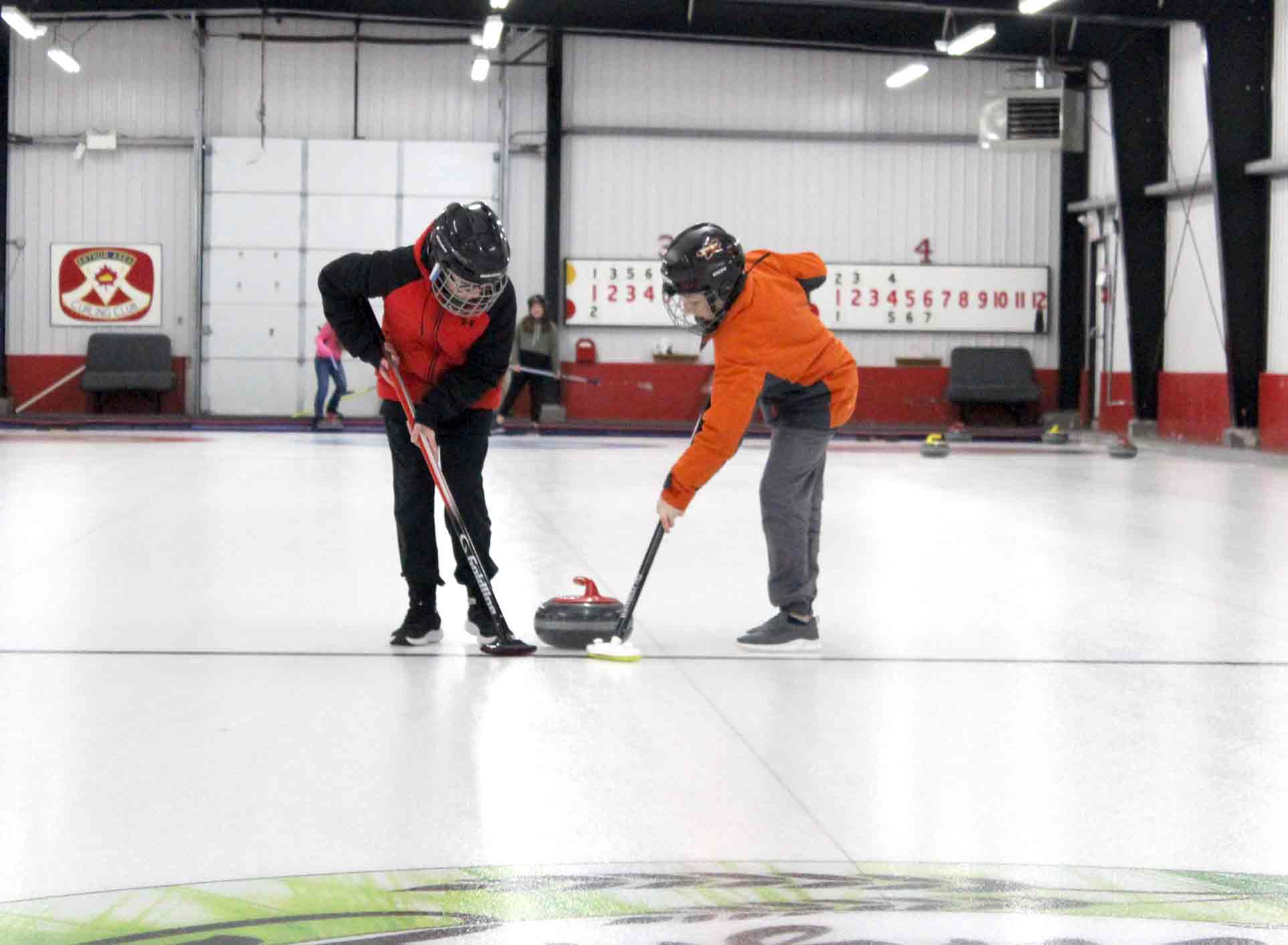 Arthur students learn to curl