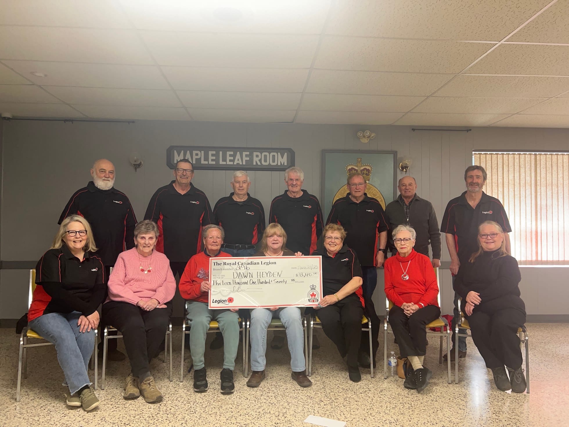 Harriston Legion's Catch the Ace committee presents $13,000 cheque to winner