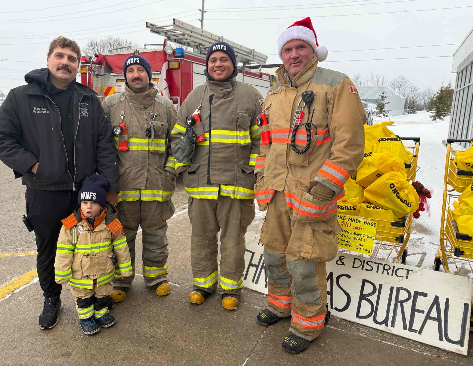 Annual fill a fire truck food drive at Mount Forest No Frills and Foodland