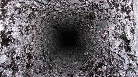 Dangers of Creosote Build-up for Chimneys and Homes