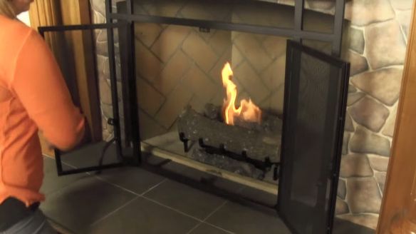 The WoodEze Single Panel Fireplace Screen With Doors Offers Convenient Spark Protection