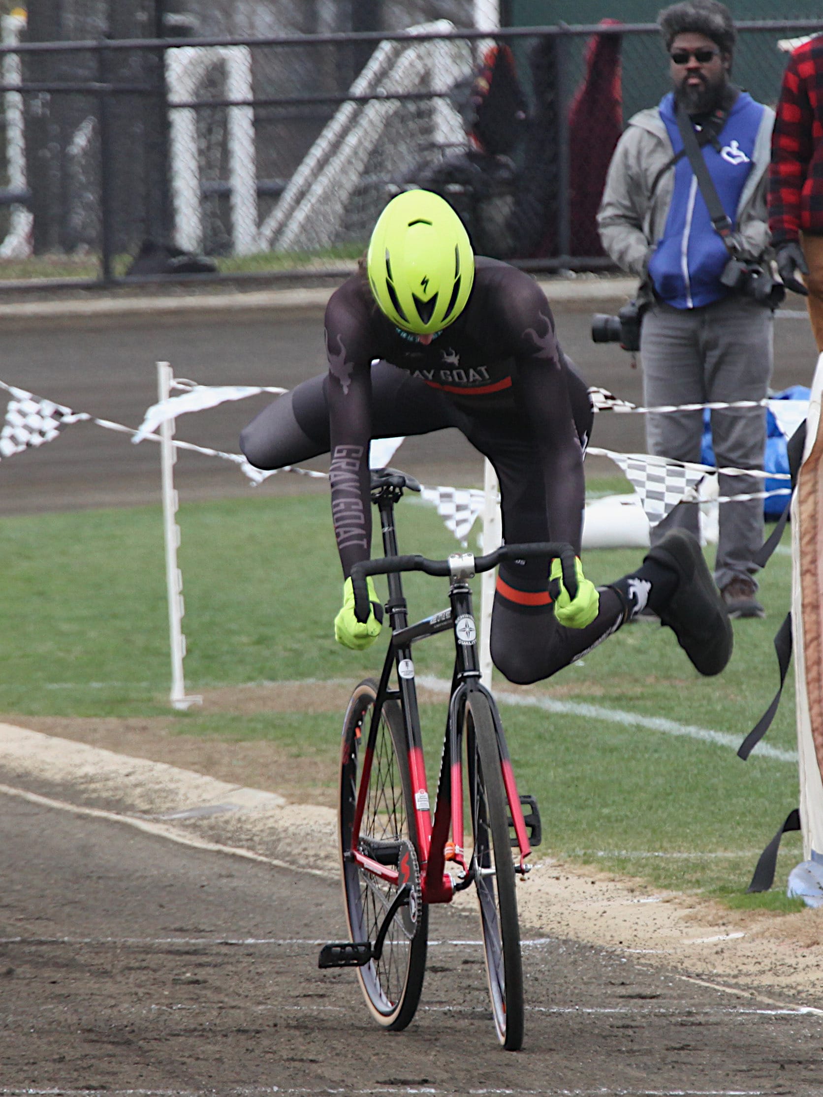 riders exchanging bicycles