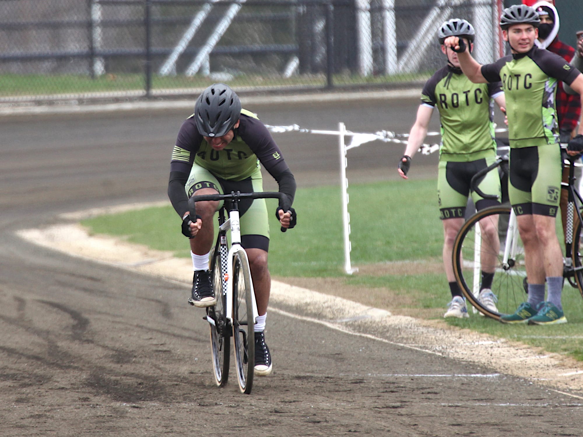 man riding a racing bicycle