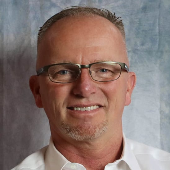 portrait of a man with eyeglasses