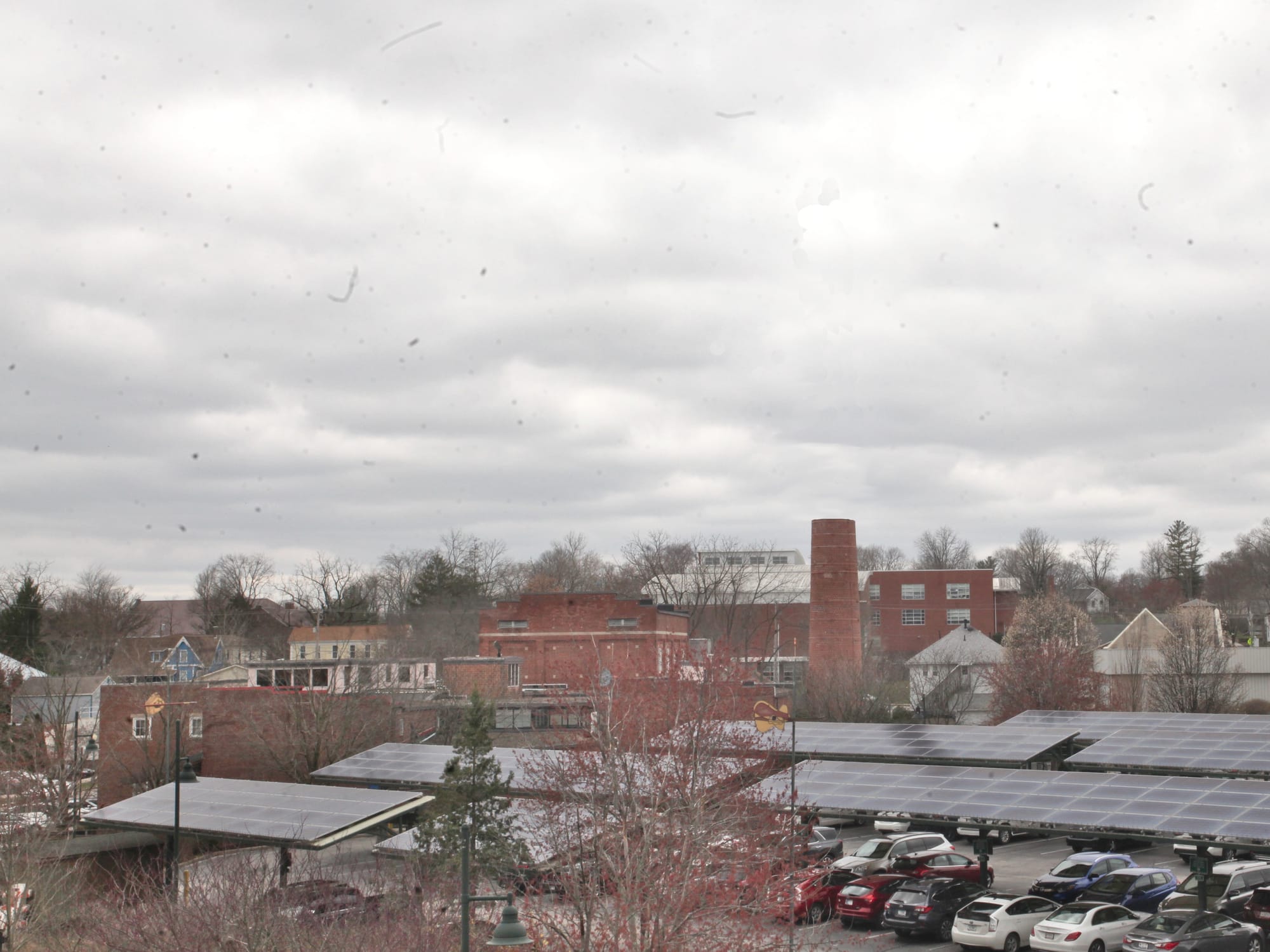 artist rendering of sky scape with stub of masonry smokestack