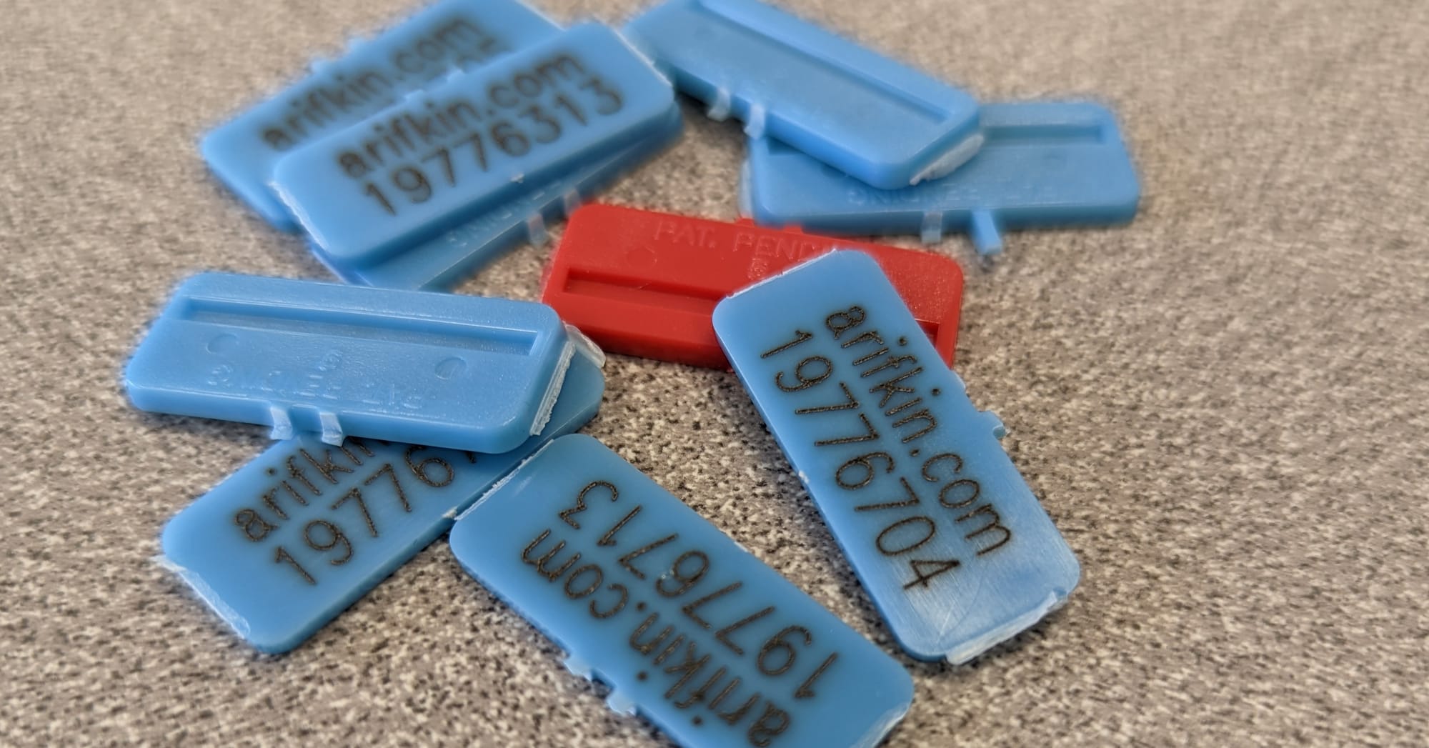 pieces of plastic with numbers and letters printed on them