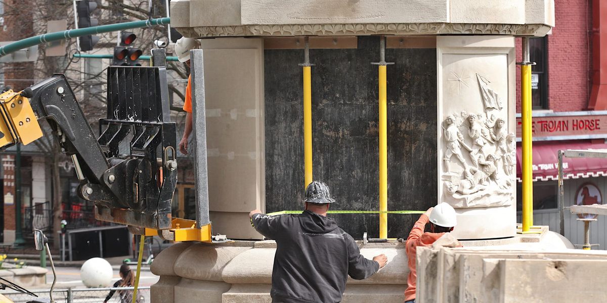 Photos: Measuring out the Alexander Memorial, as new panels get installed