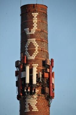 Bloomington BPW affirms order to AT&T: Take gear off Johnson’s Creamery smokestack by May 31