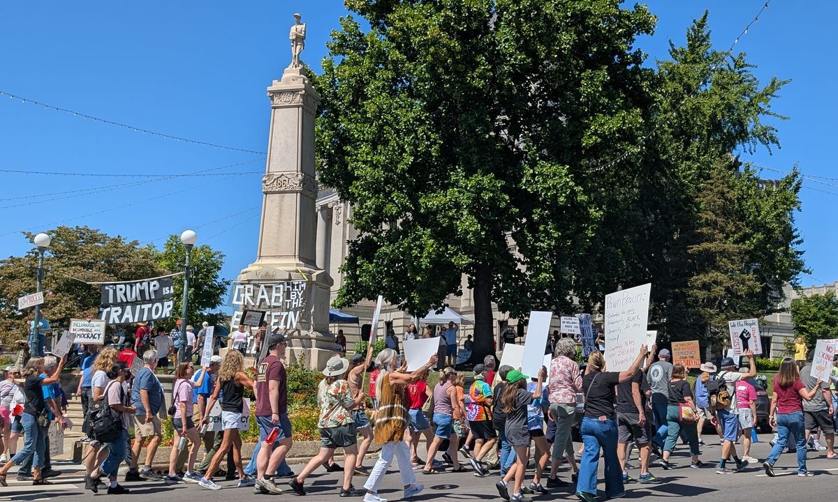 Bloomington protesters rally against billionaires, Trump policies on Labor Day