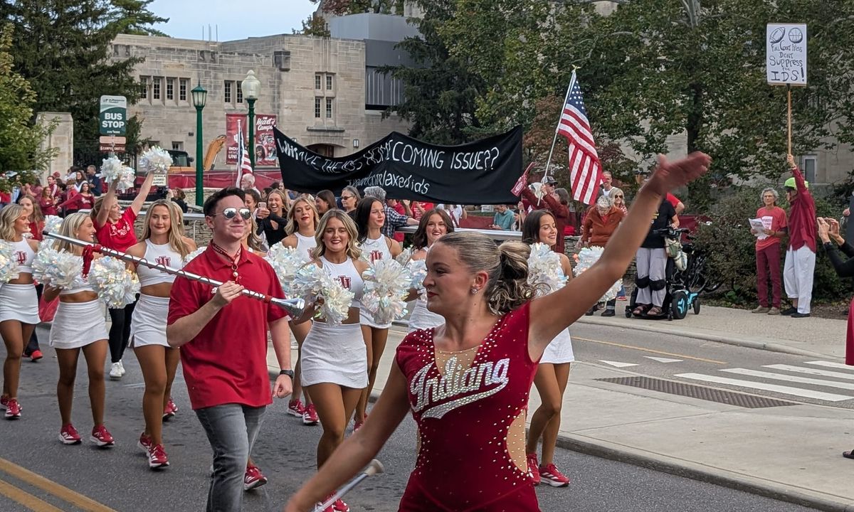 Demonstrators at IU homecoming parade chant support for student newspaper: ‘Free press! Free press! We support the I-D-S!’