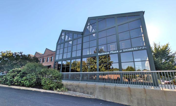 Bloomington moves to reduce private use of Showers West, 2 tenants agree to leave