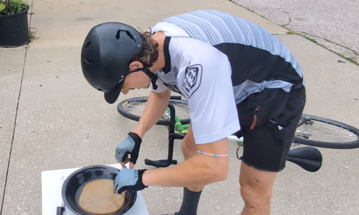 Manifest celebration of community: Alleycat bicycle riders race through Bloomington