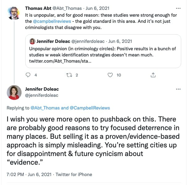 Screenshot of a tweet debate between Thomas Abt and Jennifer Doleac talking about the validity of crime studies and whether they can be used to inform a, quote, evidence-based approach.