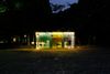 A public bathroom designed as part of the Tokyo Toilet art project is illuminated at night