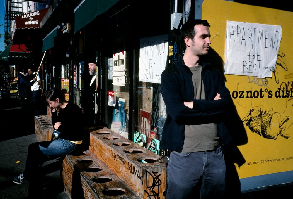 A man leans against 