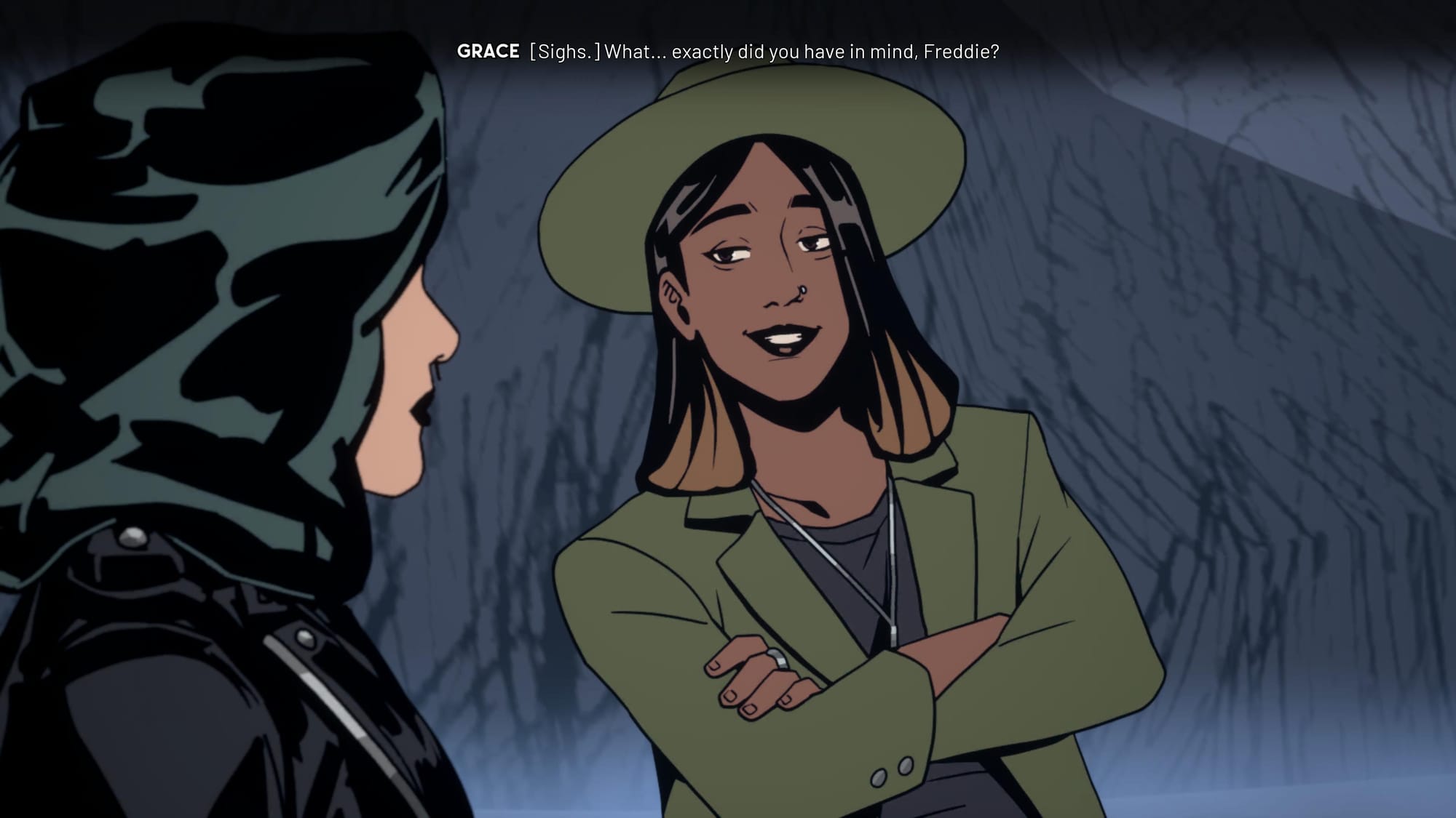 Grace, the white skinned woman with black hair and in a black jacket, from the back and Freddie, an Indian girl in green-ish hat and jacket smiling trickery