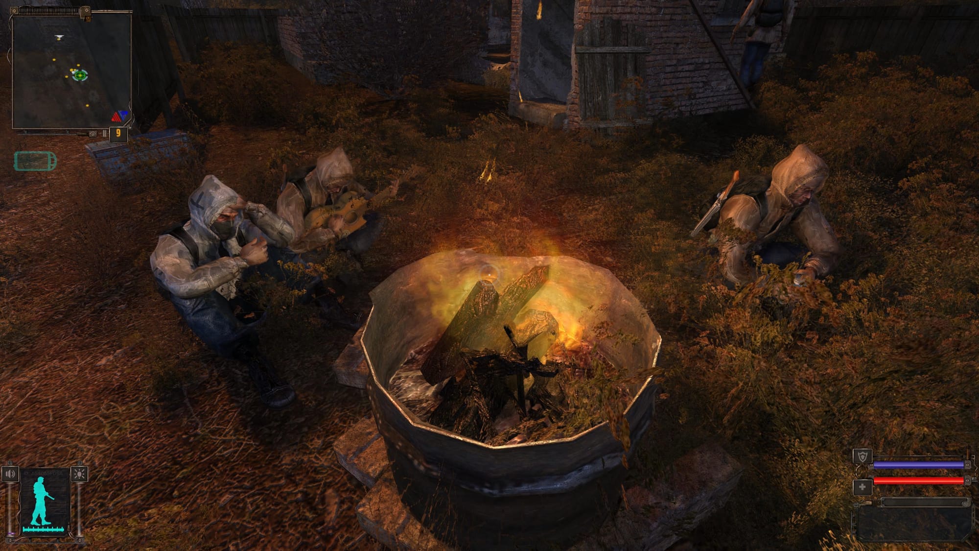 A few stalkers sitting on a grass around a bonfire in a metal barrel, resting