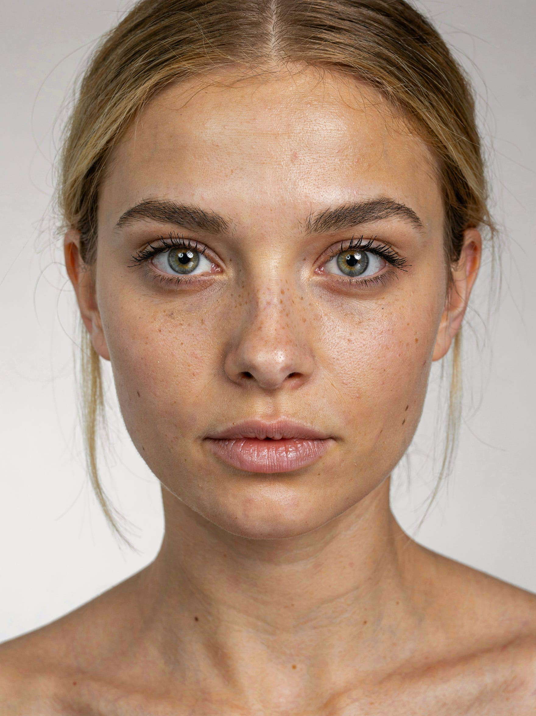 Ideogram 4.0 portrait result showing a woman with highly detailed eyes and hair, visible skin texture and a lightly made-up finish.