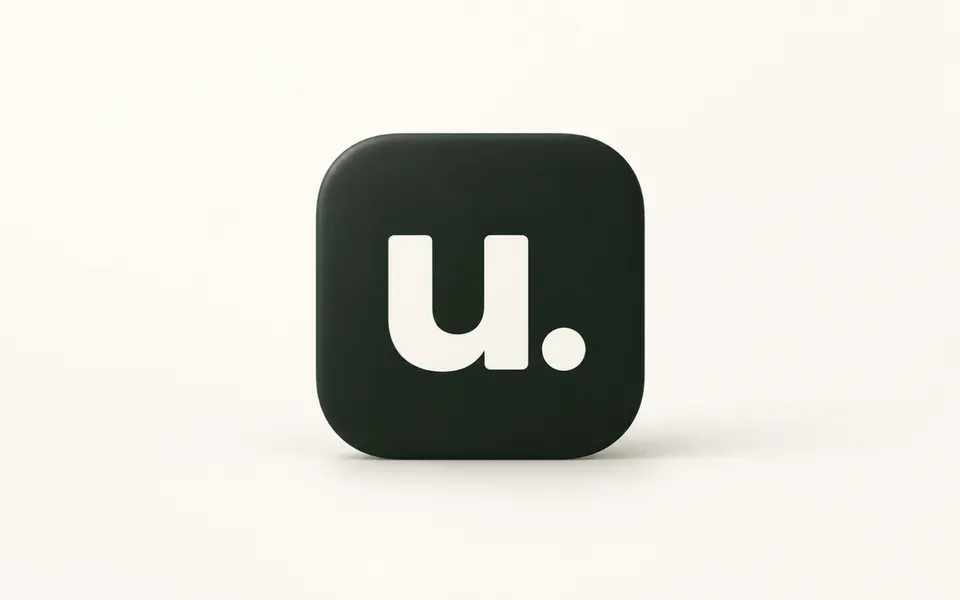 A dark green rounded-square app icon with a white “u.” centered on a soft cream background.