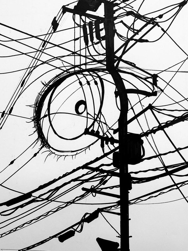 An eye made of wires on a telephone pole