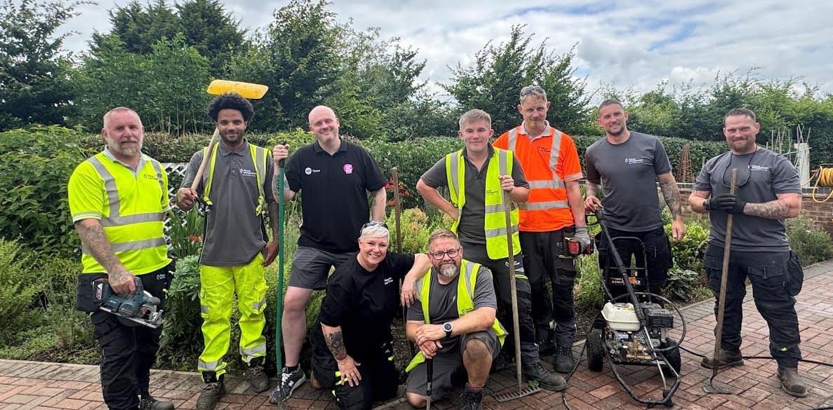 Volunteers help turn former factory into a garden of hope