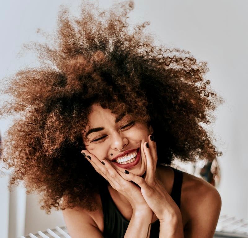 Smiling is key to happiness, new study shows